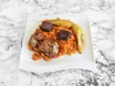 Jollof Rice Served with Fried Plantain Chicken or Assorted Meat